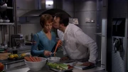Chef Riker kissing T'Pol