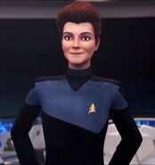 Hologram Janeway in an officer's variant uniform, sans rank insignia