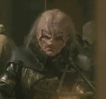 A member in the bar on Pernaia Prime's moon