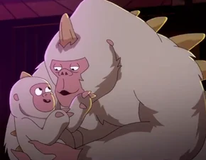 An adult holding an infant