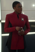 Cadet Nyota Uhura in an operations red skant uniform