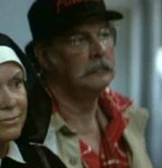 Tourist 15, 1986.jpg (13 KB) Man with mustache Played by an unknown actor