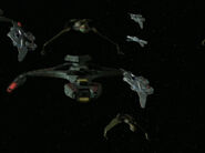 Klingon and Federation warships wait