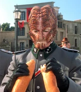 Turanj breaking a baguette.jpg (153 KB) Another scene from "The Killing Game"