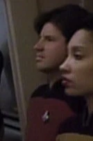 Male command division officer in corridor, 2367