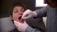 Cleaning T'Pol's teeth