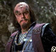 Kruge in a male Klingon captain's uniform (with stole) in 2285