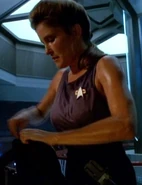 Kathryn Janeway wearing a sleeveless undershirt