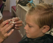 A young actor during the make-up process