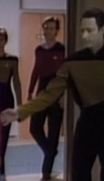 Male command division officer entering ten forward, 2366