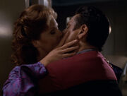 Chakotay and Archer kiss