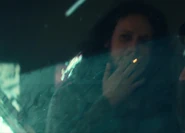 A person smoking in District Six in 2401