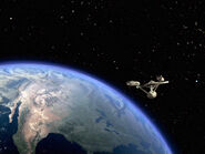 USS Enterprise orbiting Earth Two, remastered.jpg (600 KB) ...and remastered counterpart