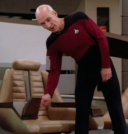 Jean-Luc Picard uses a flip-up command chair console in 2364