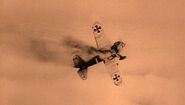 German Fokker D.VII biplane being shot down during World War I [2]