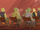 Gorn sitting in chairs.png