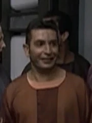 Ein Qomar an Bord der USS Voyager.