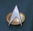 Starfleet combadge, 2360s