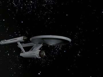 NEW YORK USA - JAN 8 2023 - Star Trek Federation starship USS Enterprise in  space, NCC 1701 - Star Trek Origins Enterprise Ship Stock Photo