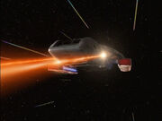 USS Rio Grande feuert Phaser bei Warp