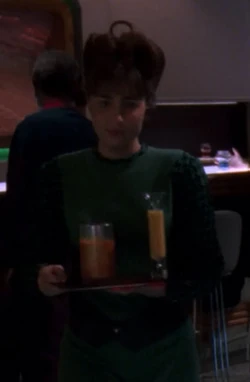 Played by an unknown actress (TNG: "Aquiel", "Birthright, Part I")