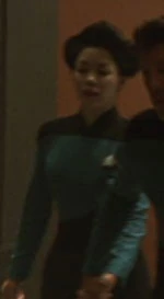 Female nurse during evacuation, 2371