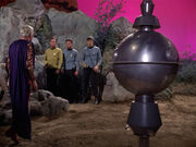 Kirk, McCoy, and Spock meet Flint and M-4