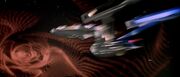 USS Enterprise caught in artificial wormhole