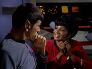 Uhura unsuccessfully chats with Spock