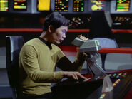 Hikaru Sulu operates the helm on the Constitution-class USS Enterprise