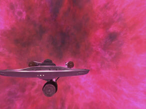 USS Enterprise leaving galactic barrier, remastered.jpg