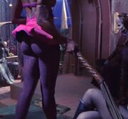 Alien brandishing whip