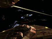 Cardassian destroyers fight with the USS Defiant