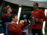 Tuvok pours Sulu tea