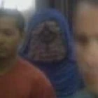 Alien with no neck and heavy folds over eyes