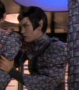 Romulan in transporter room Played by an unknown actress