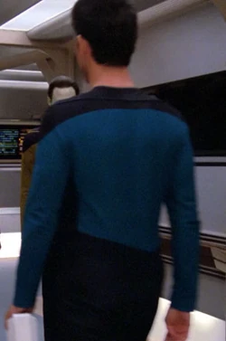 In a corridor Played by an unknown actor (TNG: "The Big Goodbye")