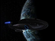 USS Voyager orbiting planet