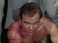 Kirk, after being whipped, supports Spock…