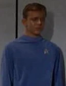 Członek załogi Enterprise w 2254