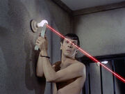 Spock creates a laser using a light bulb