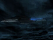 USS Voyager hit by an energy wave