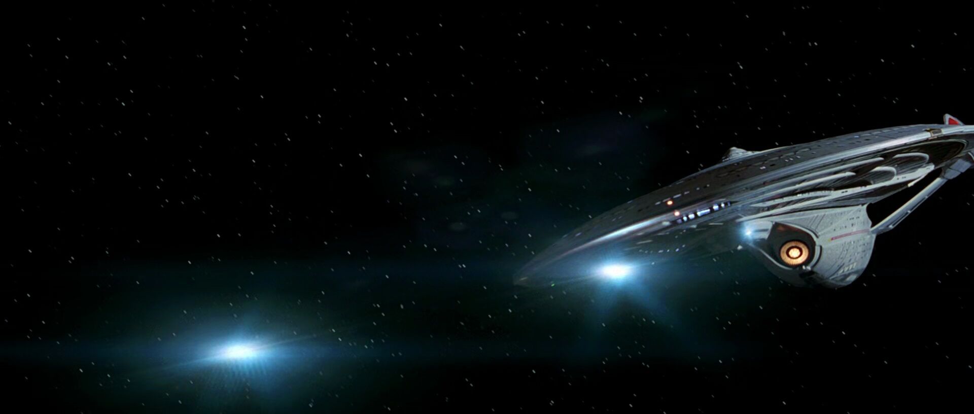 USS Enterprise-E firing quantum torpedoes.jpg