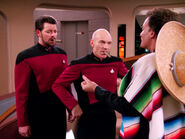 Riker and Picard with cigars.jpg (869 KB) Q distributes cigars to celebrate his return to the Q Continuum