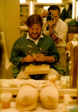 ..working on pasties for semi nude actresses in "Captain's Holiday" with fellow make-up artist Doug Drexler in the background taking his picture.