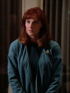 Beverly Crusher wearing sciences blue, 2364