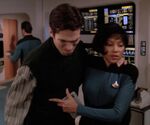 Enterprise-D science nurse 12 assists Ensign Fletcher