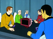 Kirk, Robert April, Sarah, April, Scott, and Spock in conference