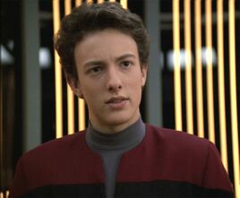 Q Jr. as an adolescent Human in (2378)