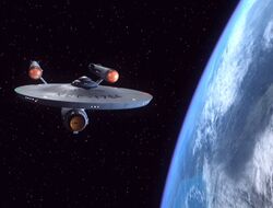 Defiant-NCC1764overEarth